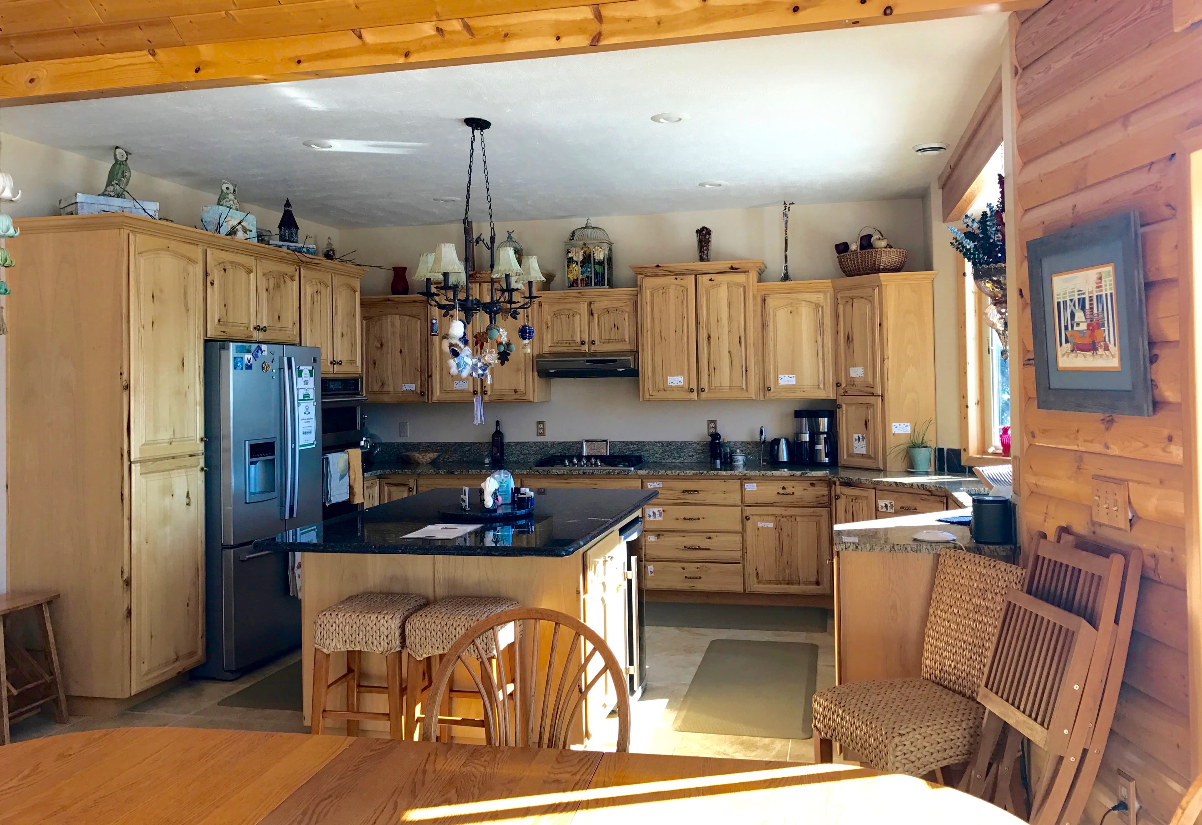 The Main House large kitchen with granite counters and gorgeous birch cabinets.